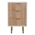 Commode moderne en bois avec tiroirs en relief et pieds dorés